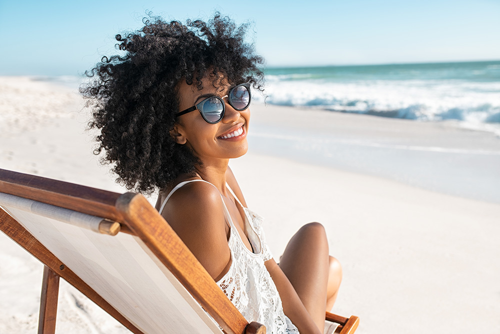 woman smiling on beach