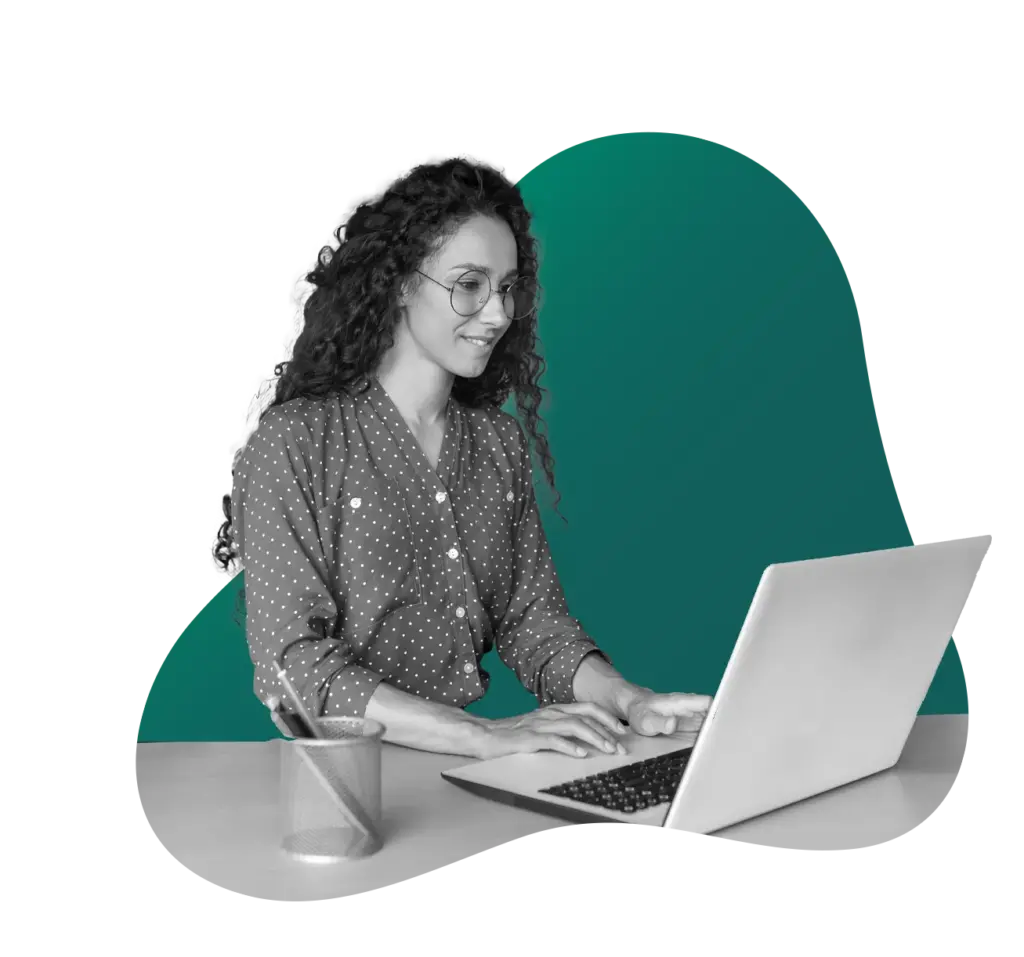 woman at desk with laptop