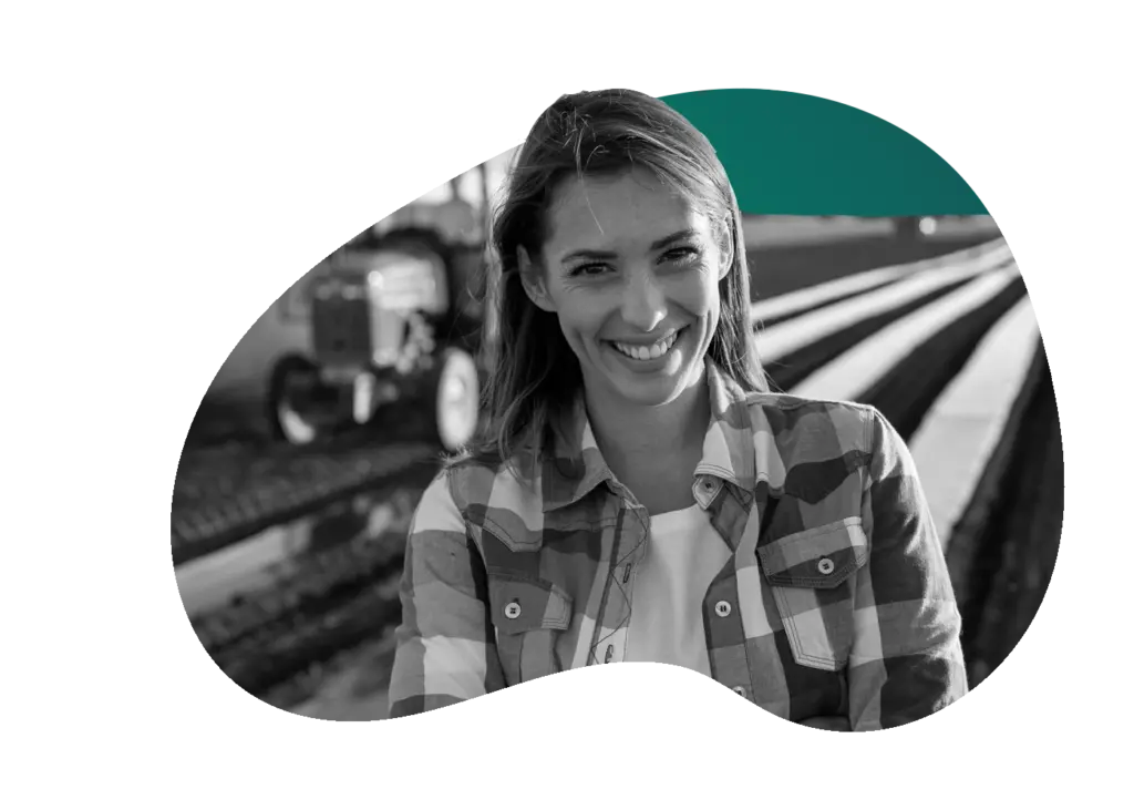 young woman on farm smiling