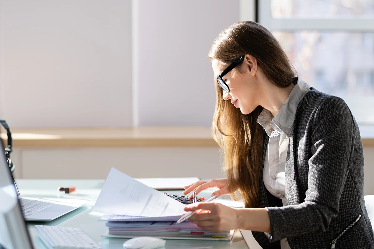 business woman looking at documents